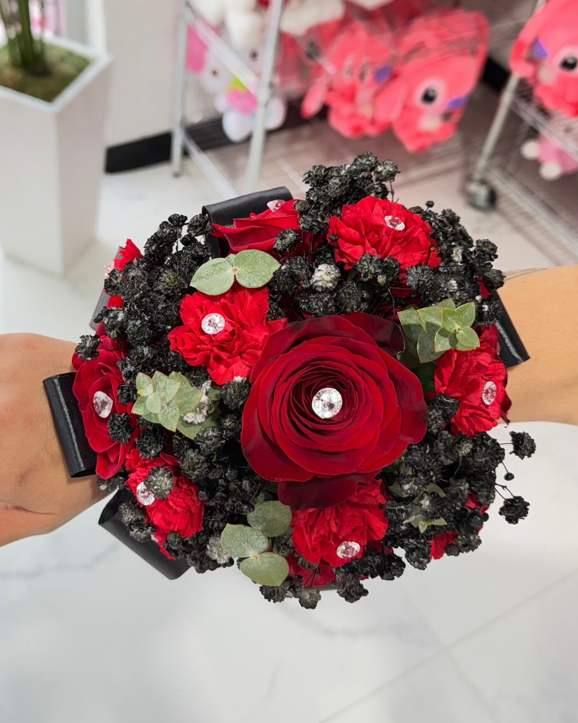 black dress red corsage lost boutonnire