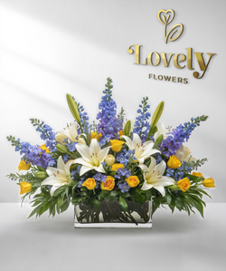 Premium Blue Delphinium and Golden Rose Memorial Arrangement