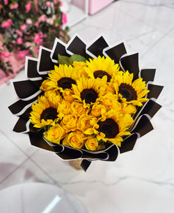 25 Yellow Roses + sunflowers