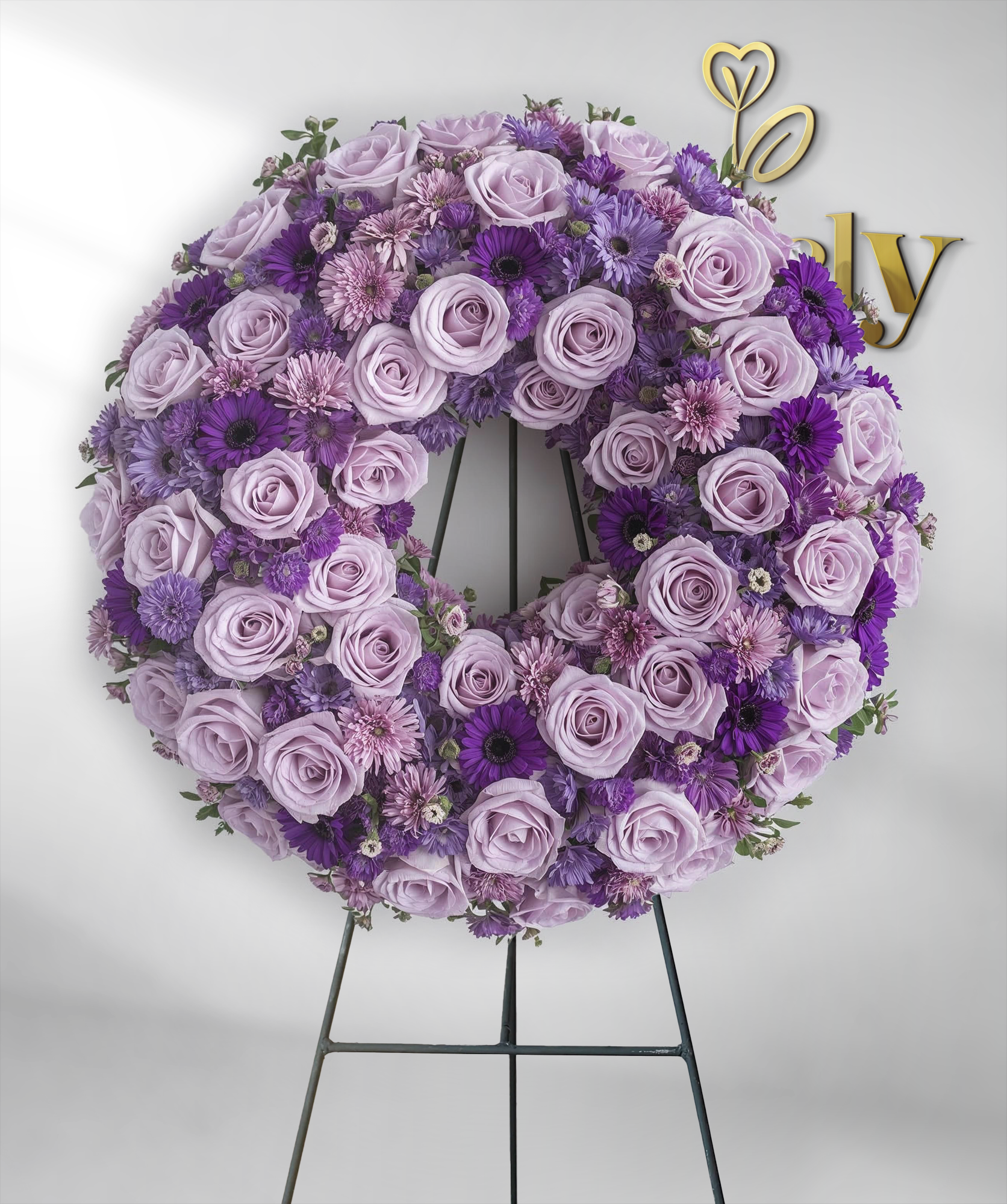 Infinite Grace Lavender Rose Funeral Wreath – Lovely Flowers