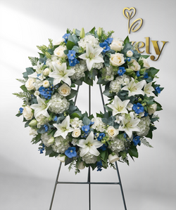 Elegant White & Blue Funeral Wreath with Lilies, Roses & Hydrangeas