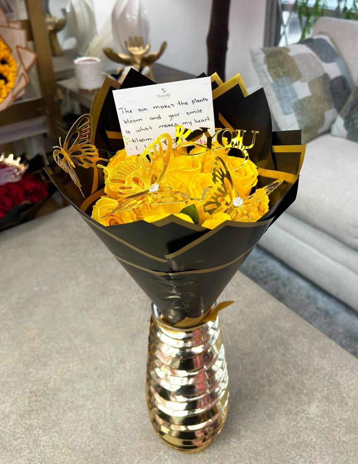 12 Yellow Roses Black Wrapping