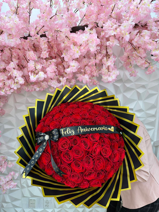75 Red roses with gold and black paper