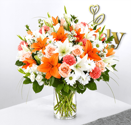 Peach, Orange & White Mixed Flower Arrangement