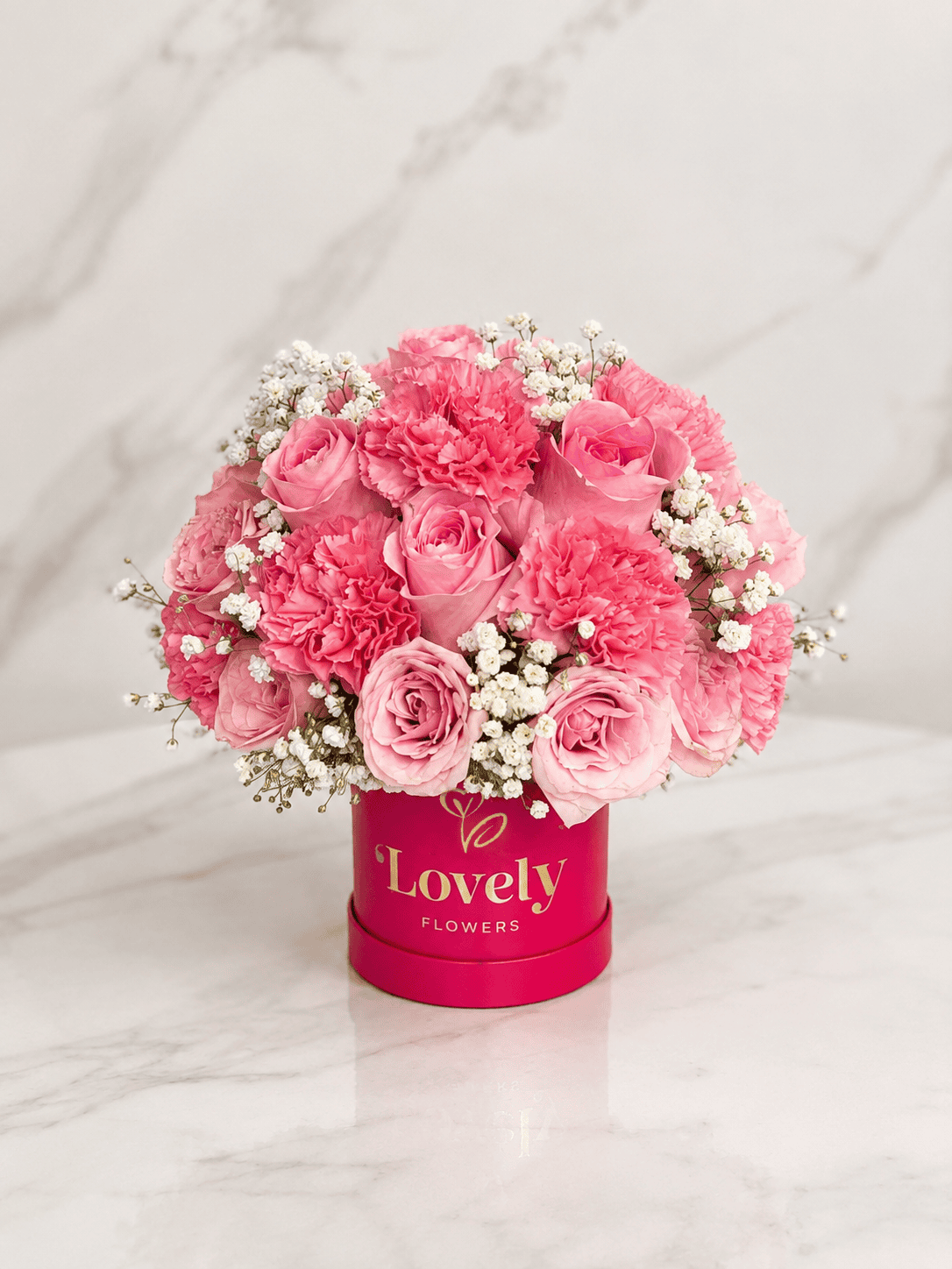 Small Fuchsia Round Box with 20 Roses, Carnations and Baby Breath