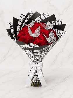 12 rosas rojas de Dior
