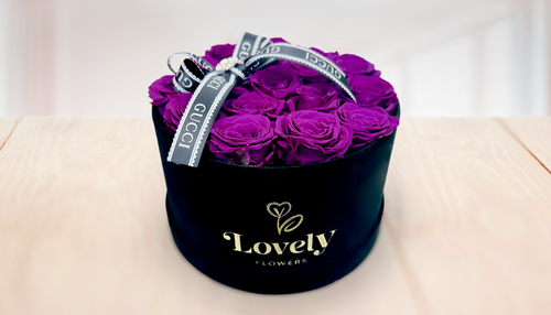 Caja redonda mediana con rosas de la eternidad