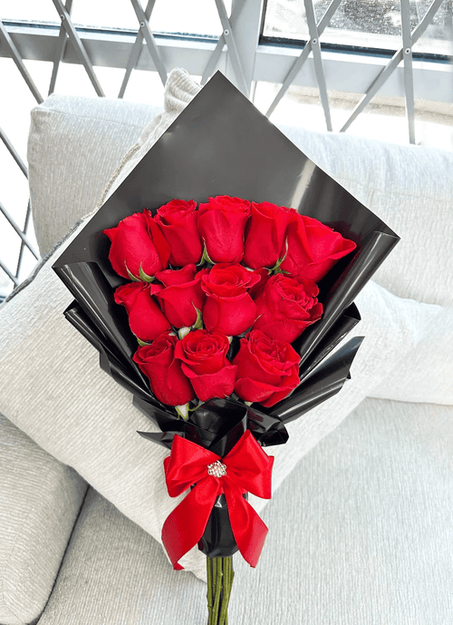 12 Flat Roses with All black Wrapping