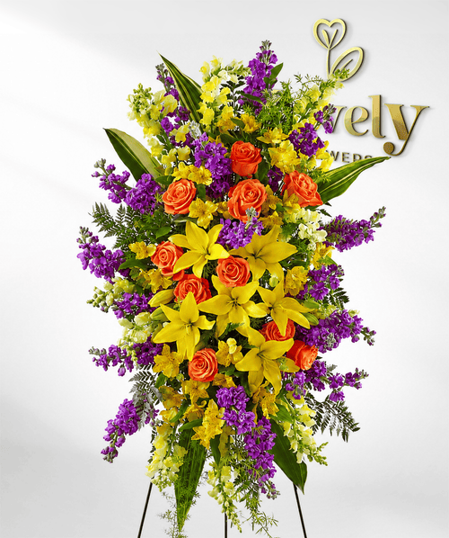 Orange Roses, Yellow Lilies & Purple Stock Standing Spray