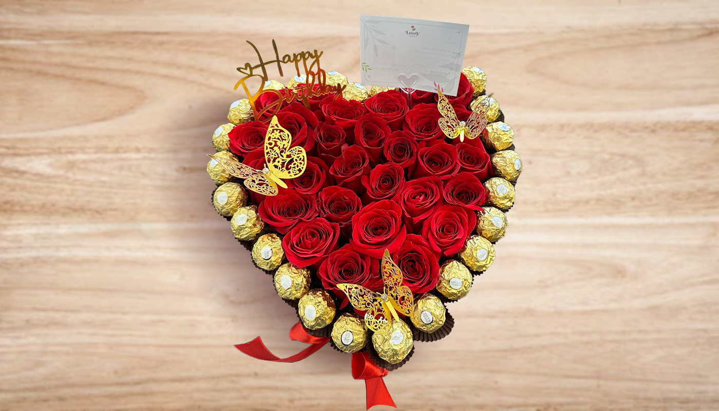 Heart box of red roses & chocolates